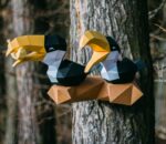 Papercraft de toucans sur branche en origami 3D