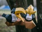 Papercraft de toucans sur branche en origami 3D