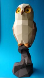 Papercraft owl on branch in 3D origami