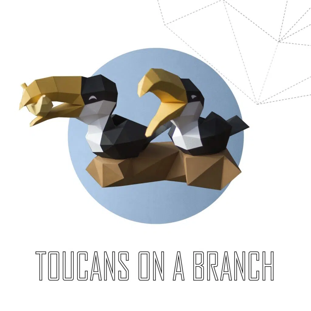 Papercraft von Tukanen auf Ast im 3D-Origami