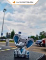 Papercraft cute sitting elephant in origami