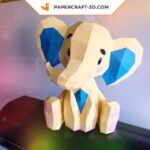 Papercraft cute sitting elephant in origami