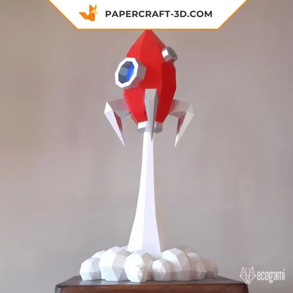 Papercraft de cohete despegando en origami 3D