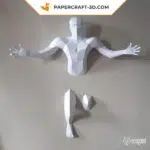 Papercraft man with outstretched arms in origami