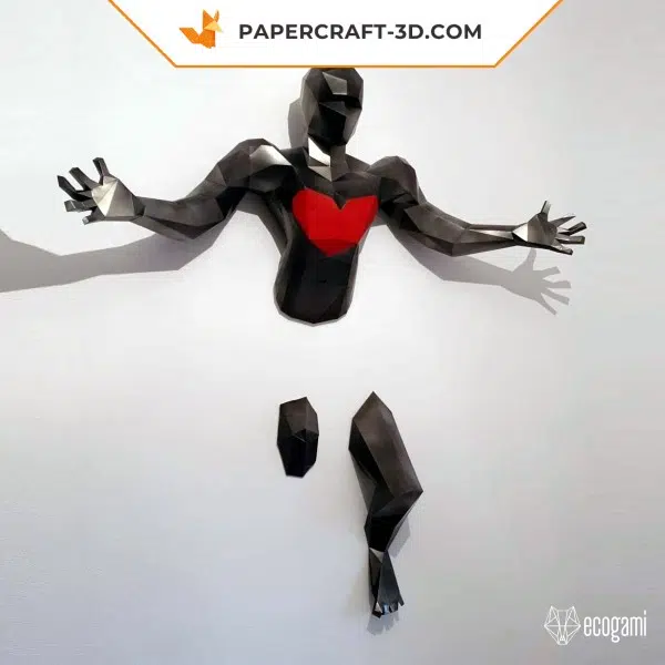 Papercraft man with outstretched arms in origami