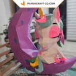 Papercraft baby unicorn on moon in origami