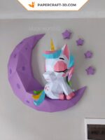 Papercraft baby unicorn on moon in origami