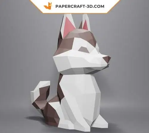 Papercraft eines sitzenden Husky-Welpen als 3D-Origami