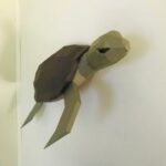 Papercraft de meia tartaruga mural em origami 3D