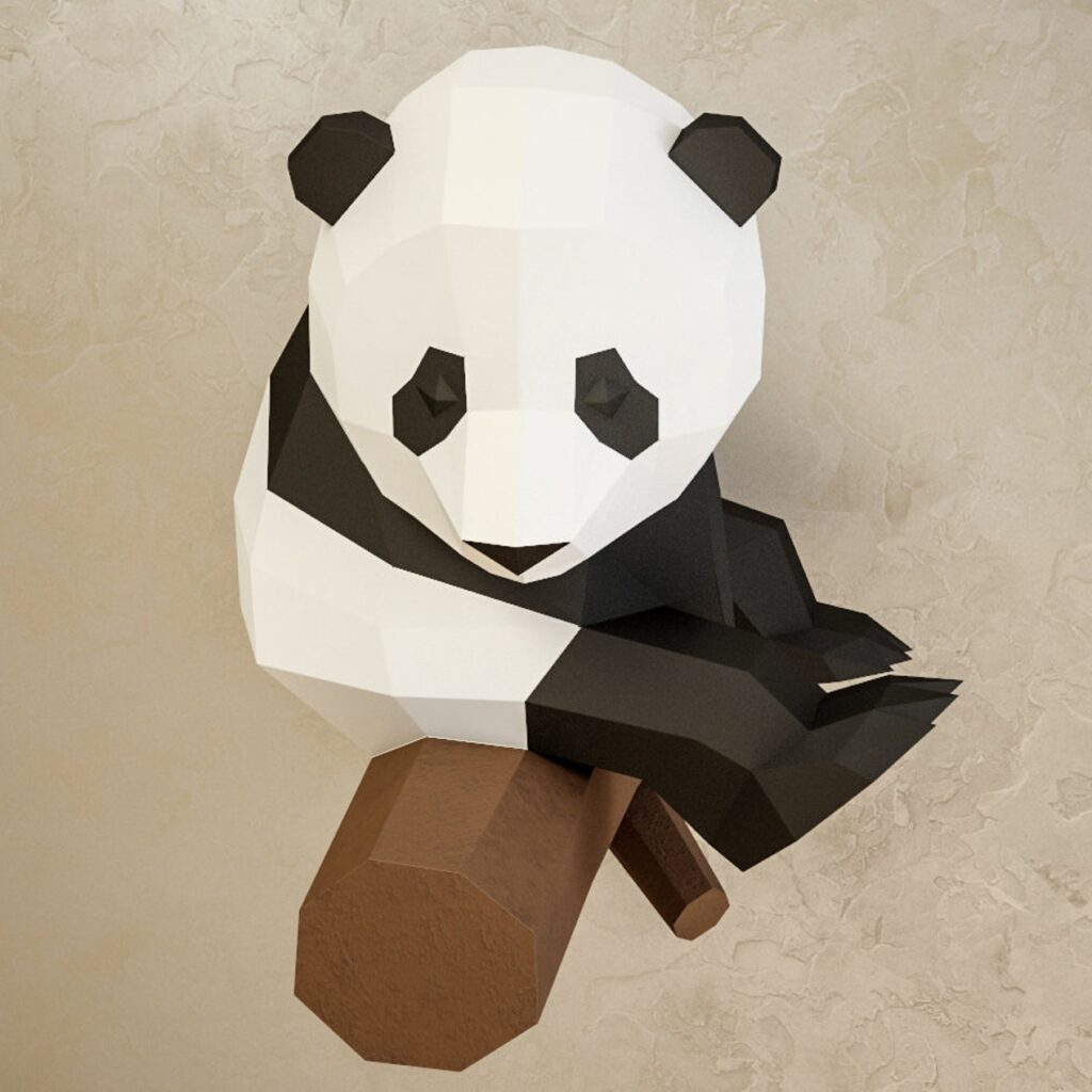 Papercraft panda on branch in 3D origami