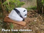 Papercraft panda on branch in 3D origami