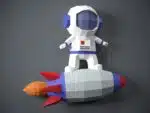 Papercraft de astronauta em foguete em origami 3D