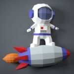 Papercraft astronaut on rocket in 3D origami