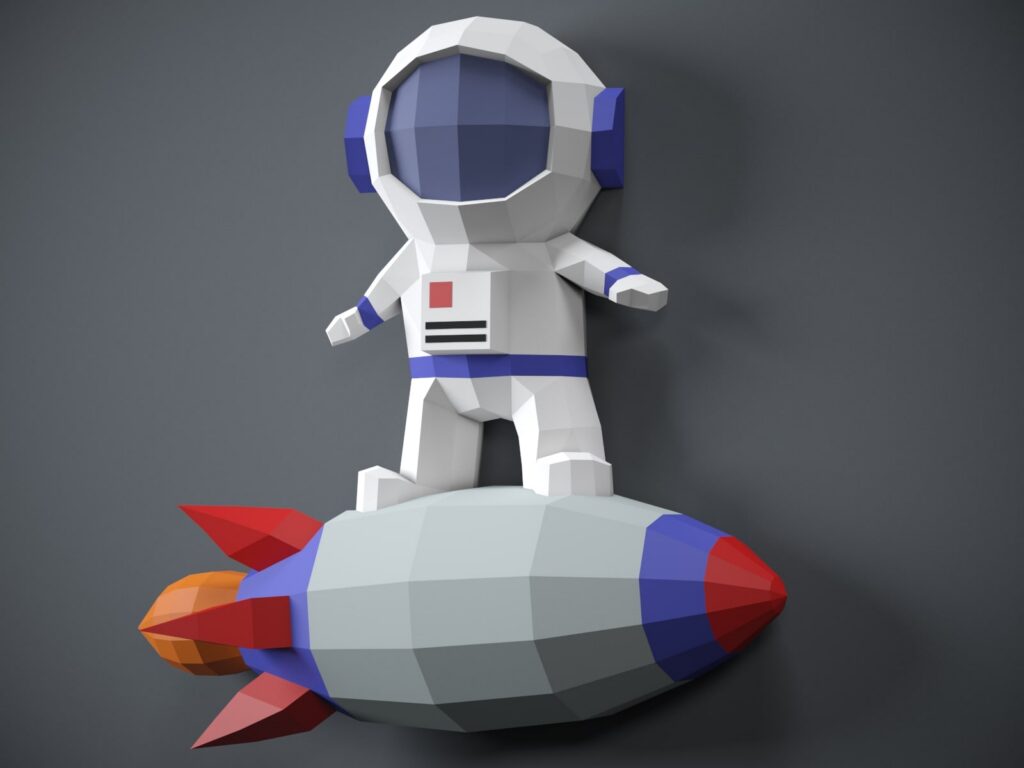 Papercraft di astronauta su razzo in origami 3D