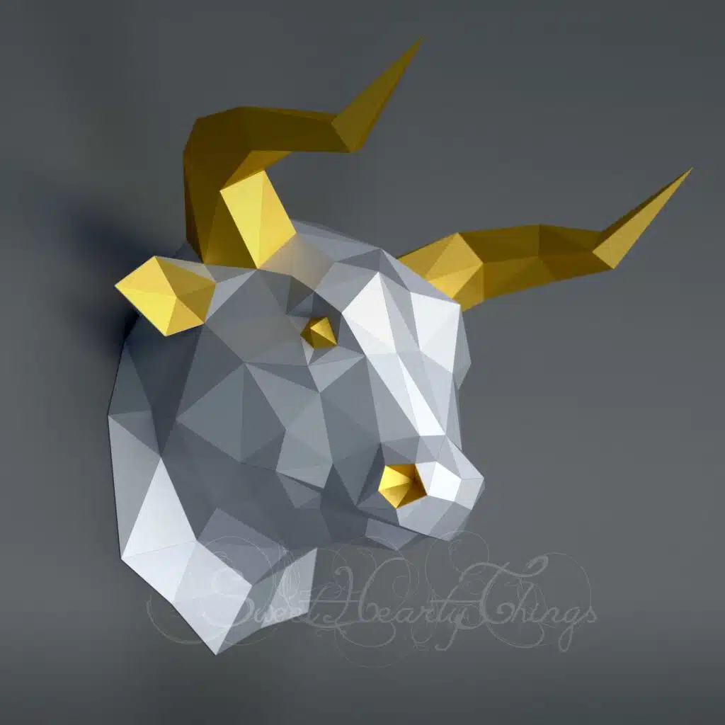 Origami papercraft bull head with golden horns