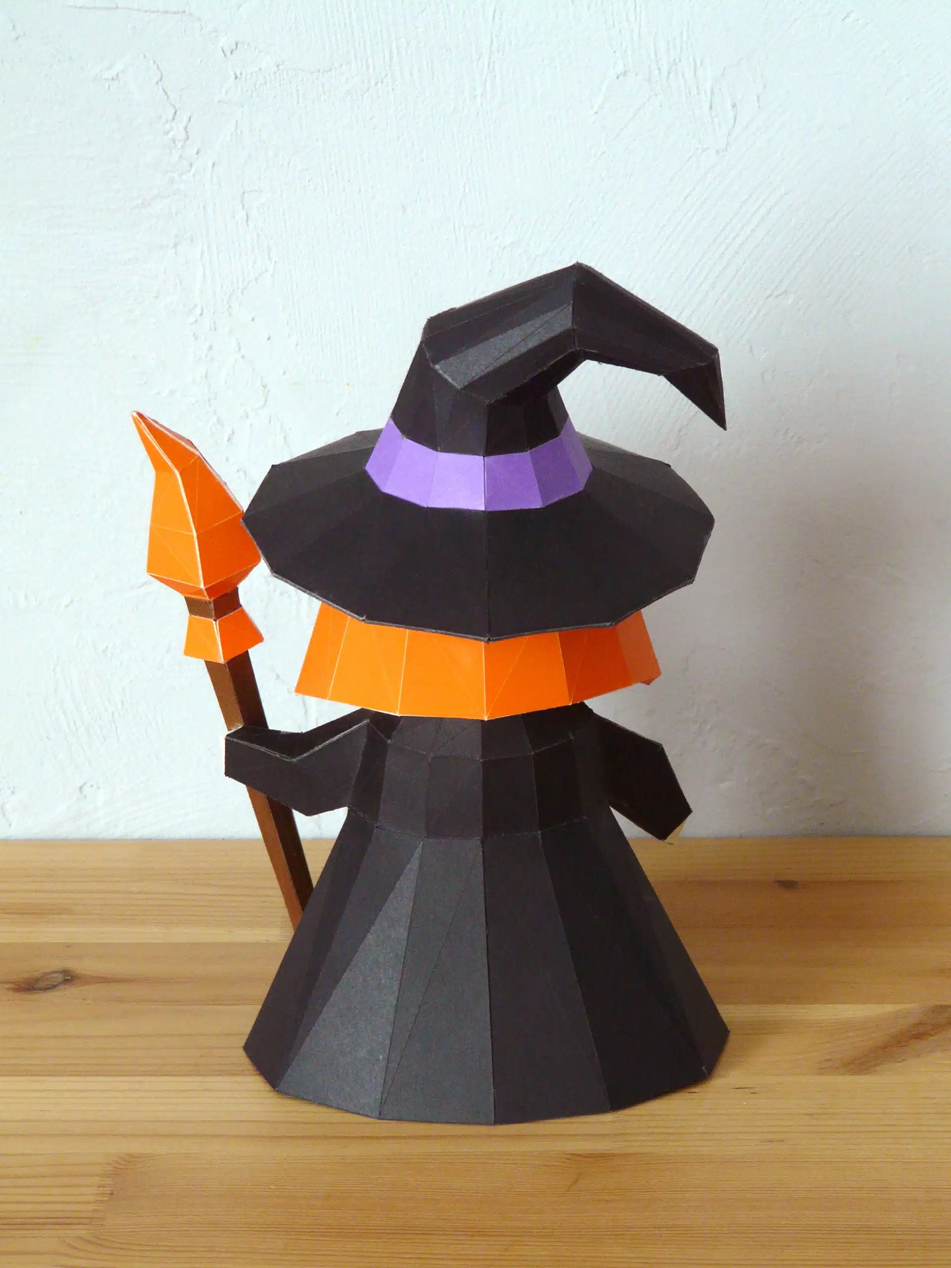 3D origami papercraft of a little witch, side view