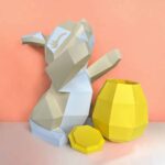 Papercraft Easter bunny with egg in 3D origami