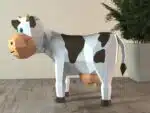 Papercraft di mucca cartoon in origami 3D