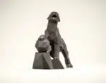 Papercraft de pantera en un acantilado en origami 3D
