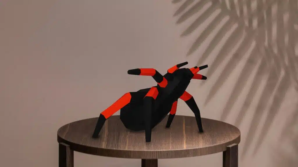 Zwarte en oranje spin in 3D-papercraft, weergave 3