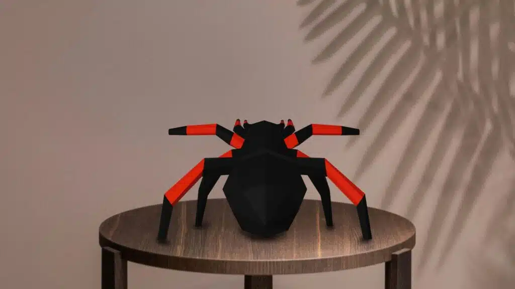 Zwarte en oranje spin in 3D-papercraft, weergave 2