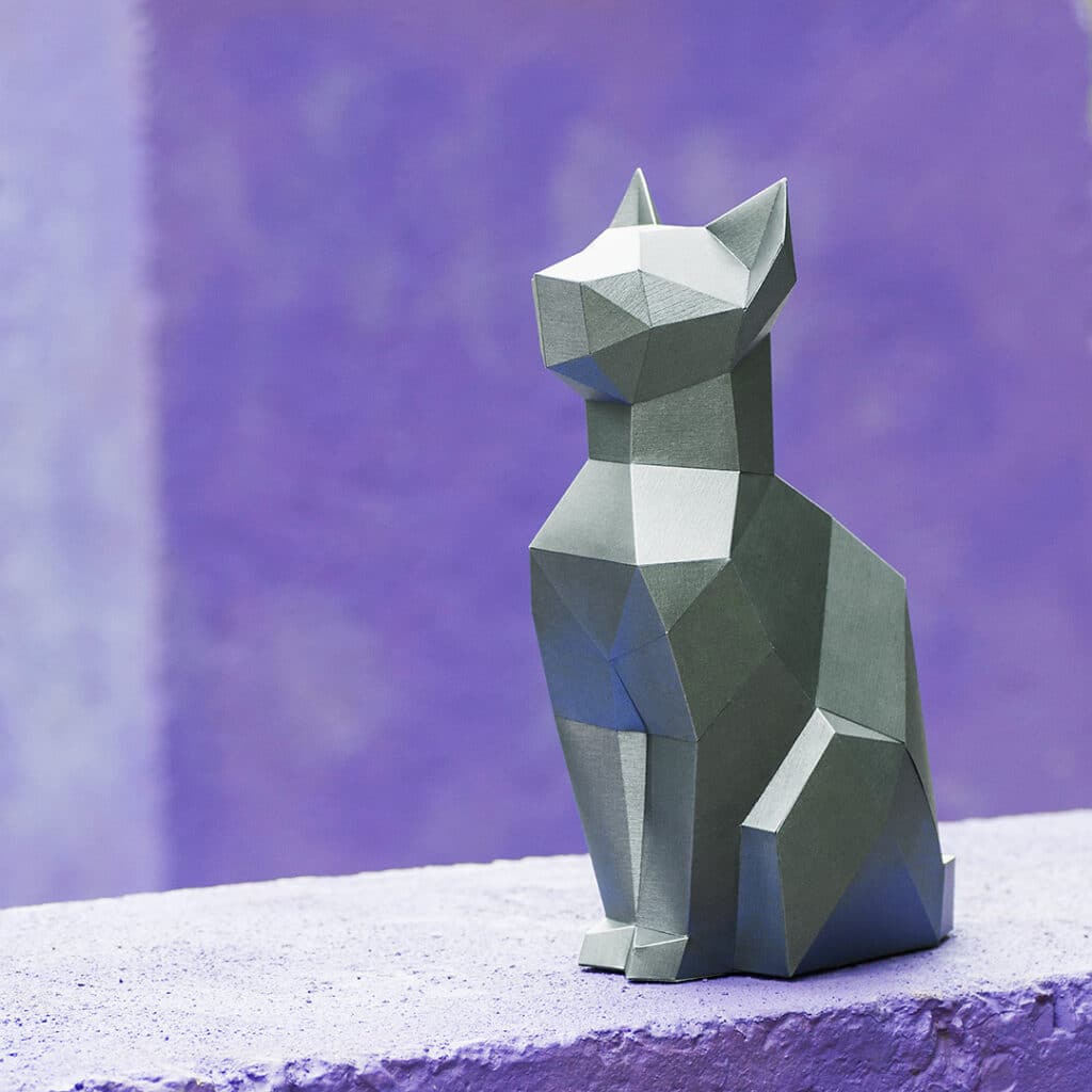 Papercraft of sitting cat in 3D origami