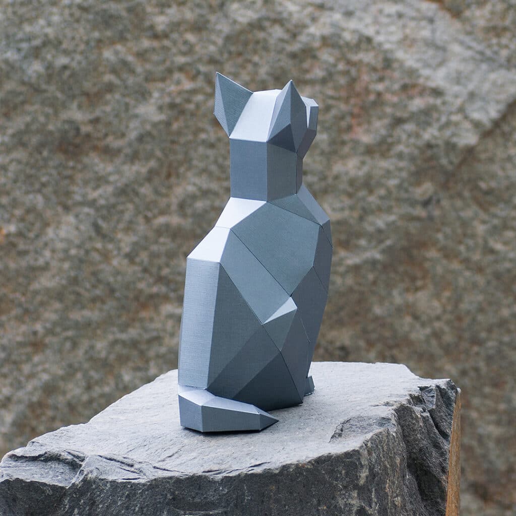 Papercraft of sitting cat in 3D origami