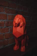 Papercraft of sitting lion in 3D origami