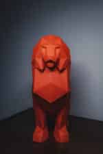 Papercraft of sitting lion in 3D origami