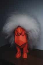 Papercraft of sitting lion in 3D origami