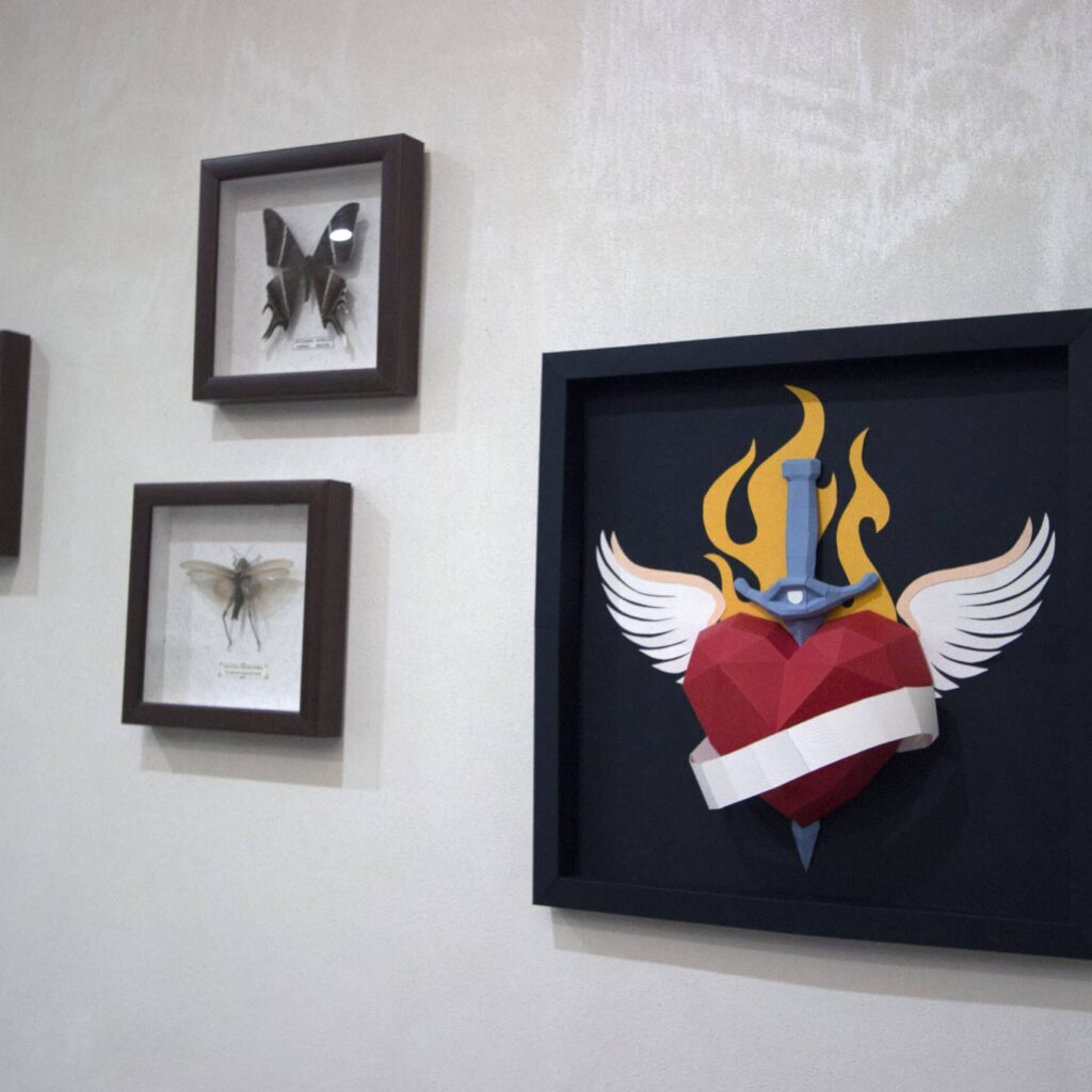 Papercraft tattooed heart frame in 3D origami