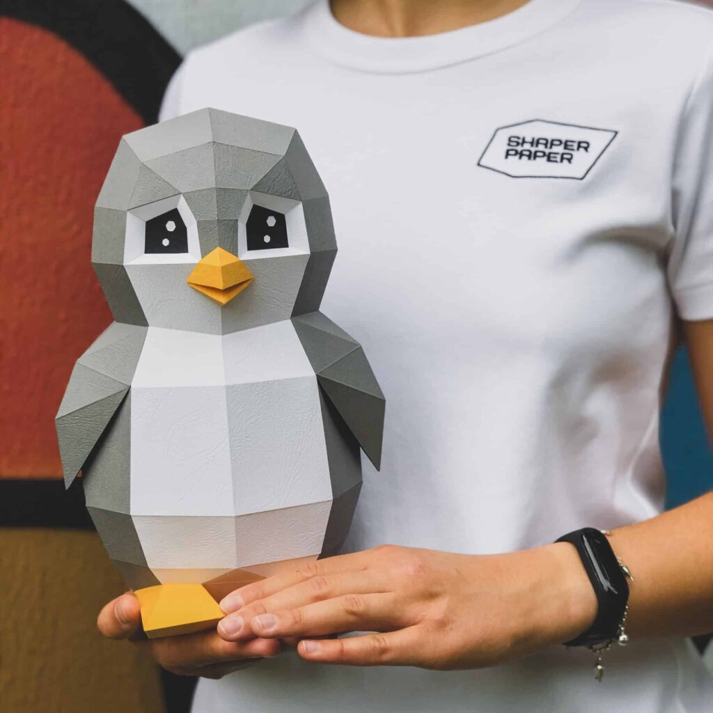 Papercraft penguin toy in 3D origami