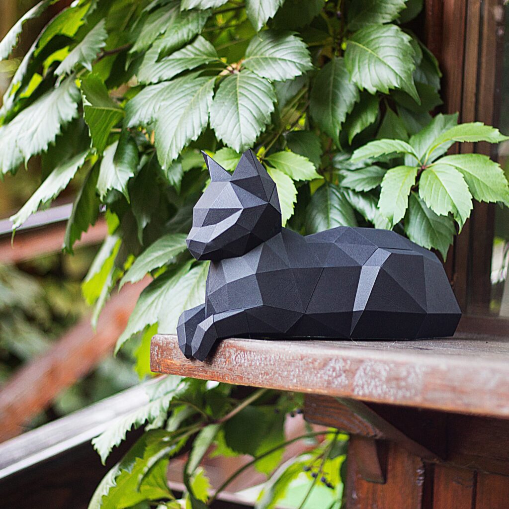 Papercraft of reclining cat in 3D origami