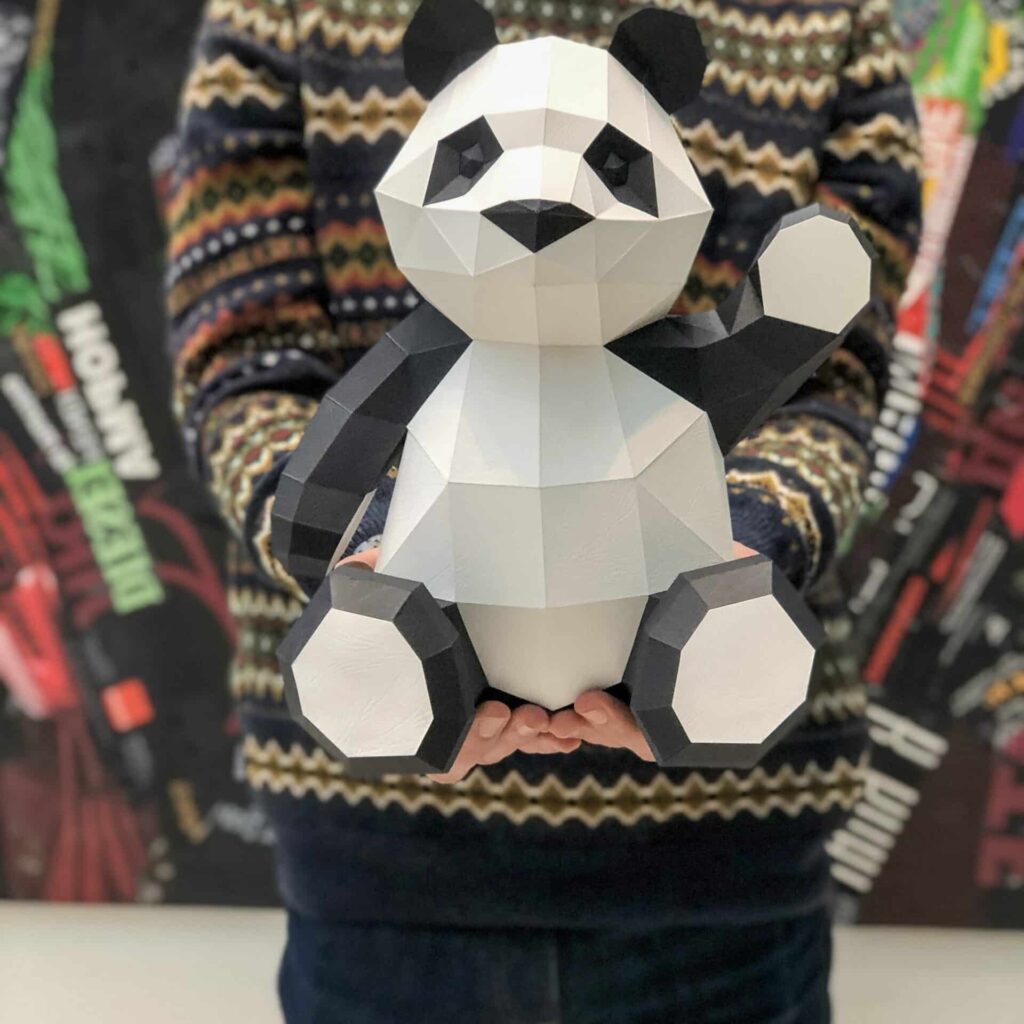 Papercraft of cute panda in 3D origami