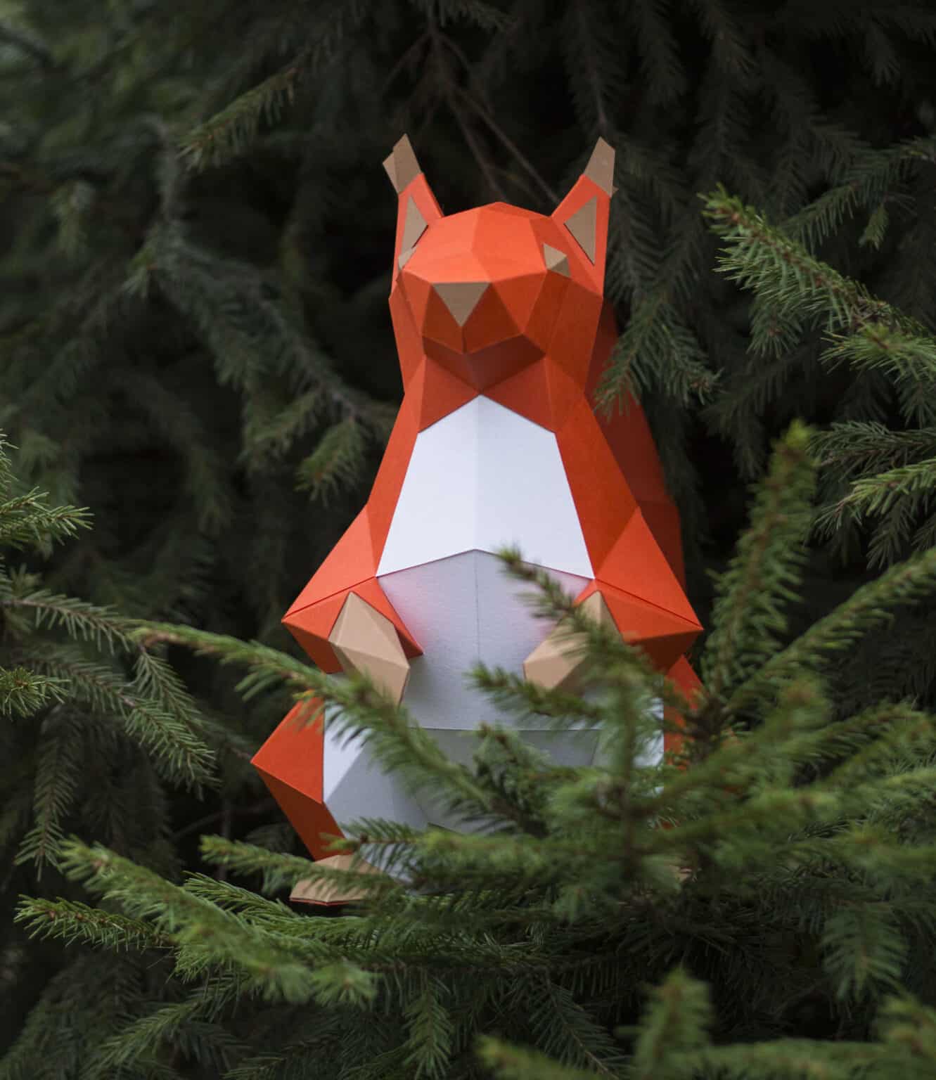 Papercraft of sitting squirrel in 3D origami