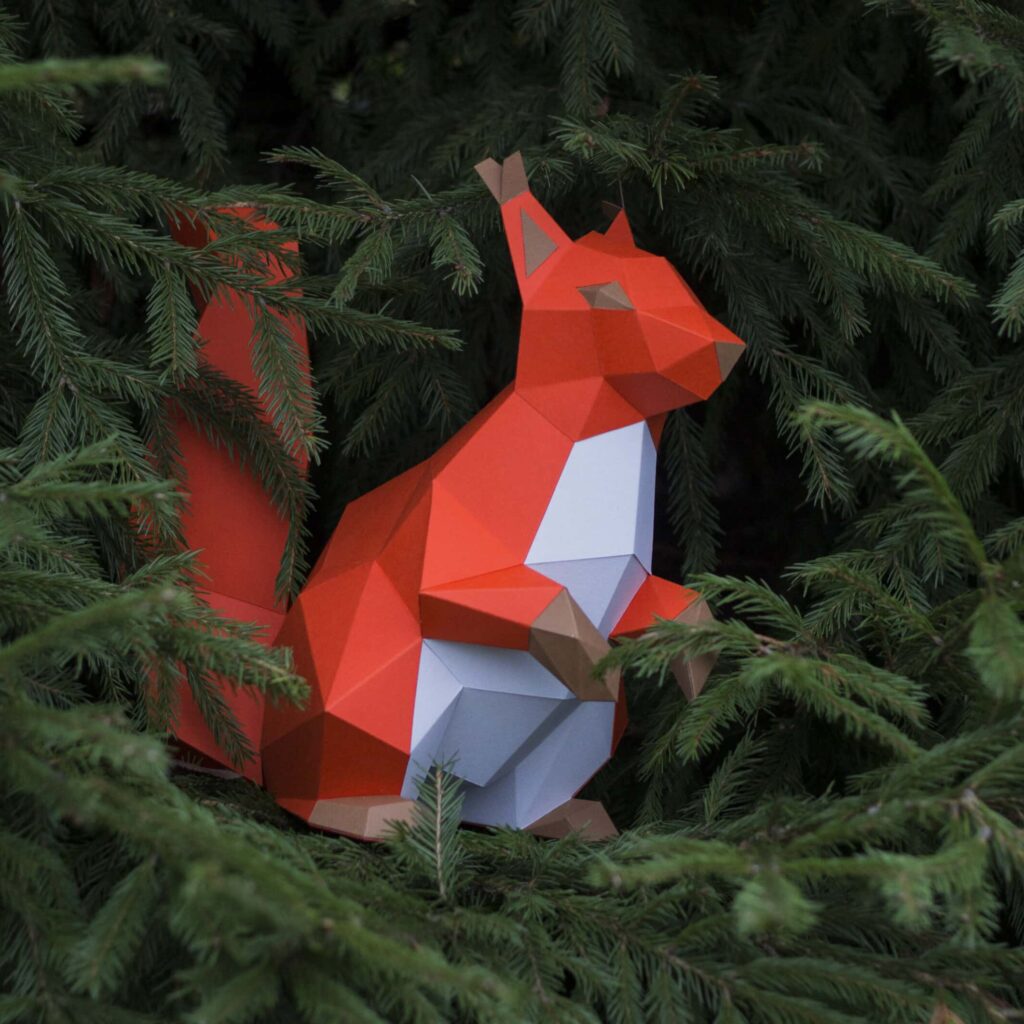 Papercraft of sitting squirrel in 3D origami