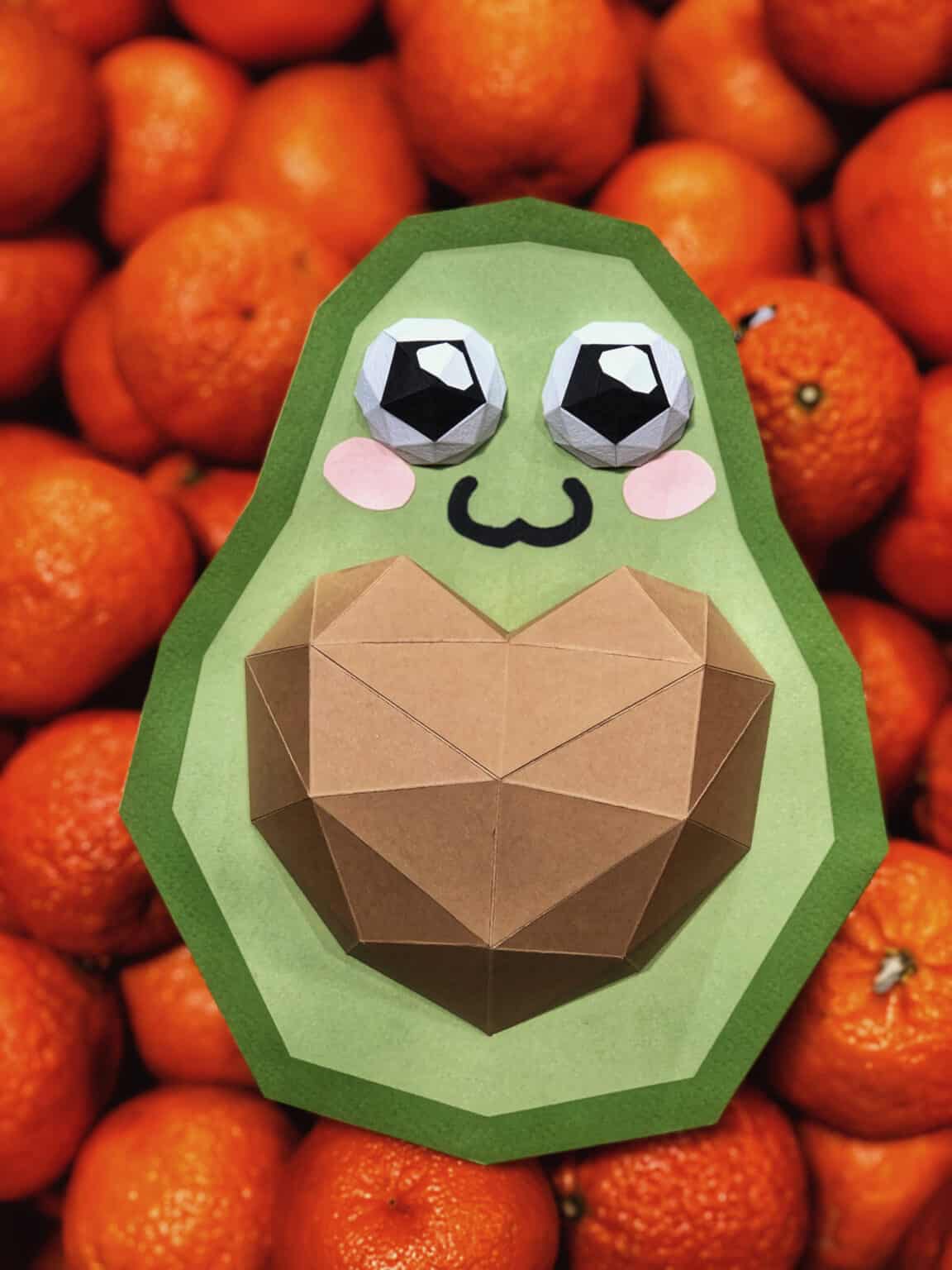 Papercraft avocado with heart in origami 3D