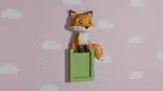 Zittende vos in papercraft 3D op plank, weergave 3