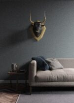 Papercraft eines Stiers auf einem Schild in Origami 3D