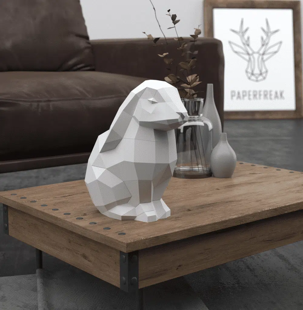Papercraft de coelho sentado branco em origami 3D