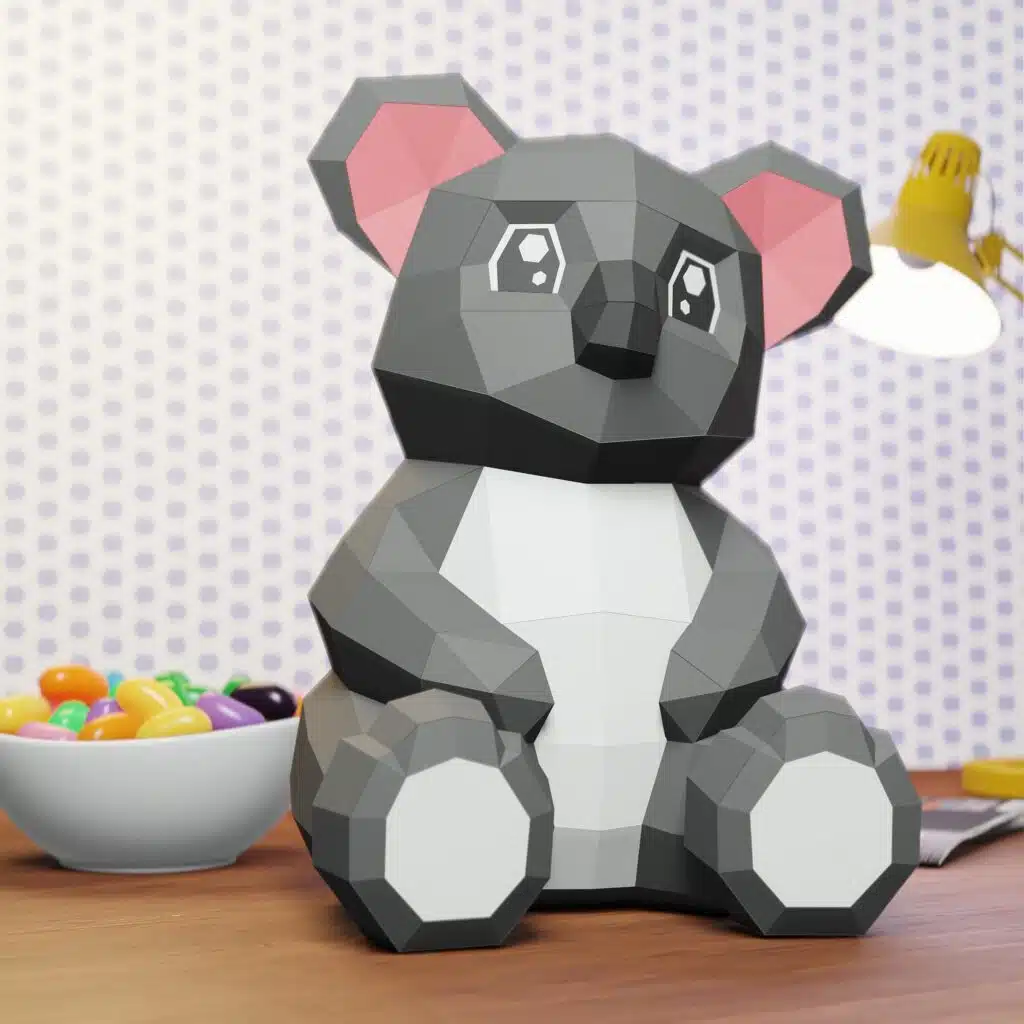 Papercraft di cucciolo di koala con orecchie rosa in origami 3D