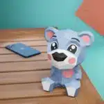Blauwe cartoonbeer met hart in papercraft 3D, weergave 8