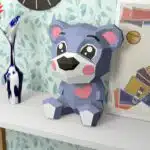 Blauwe cartoonbeer met hart in papercraft 3D, 3D-model