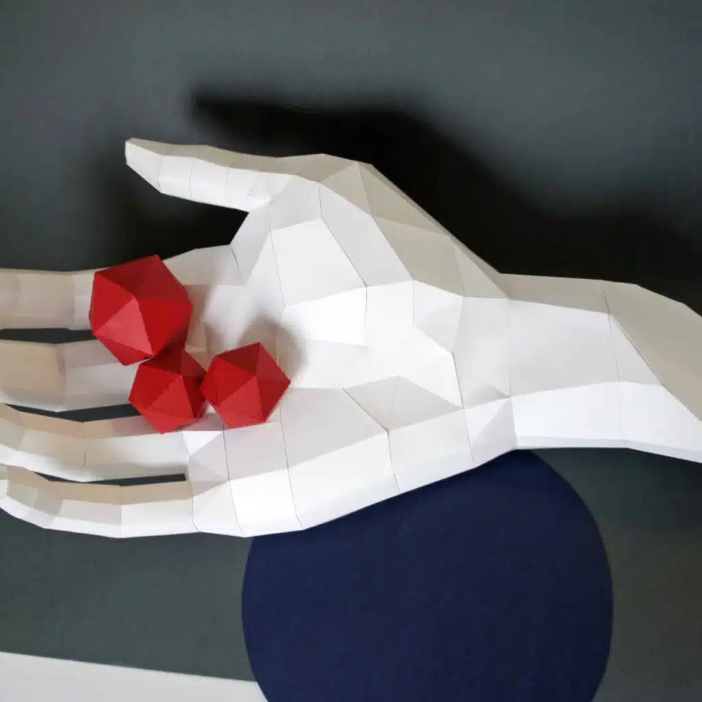 Papercraft of a right hand in origami 3D