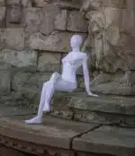 Papercraft di donna seduta in origami 3D