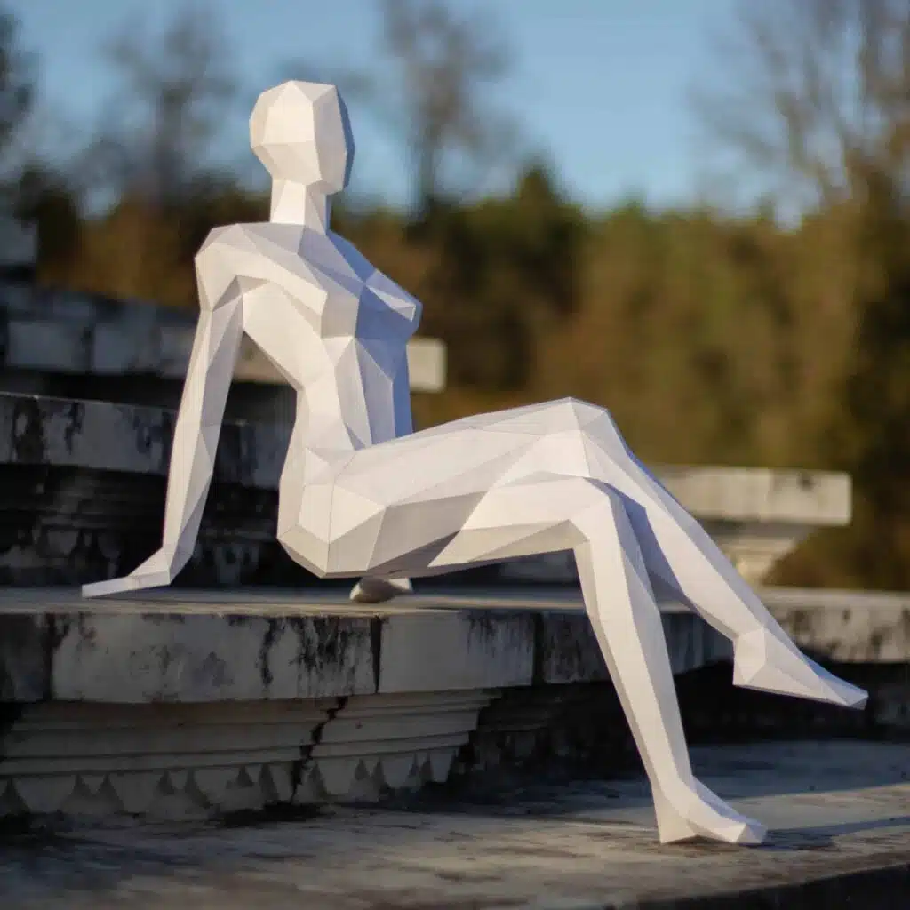 Donna seduta in papercraft 3D