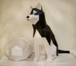 Papercraft of lounging husky in origami 3D