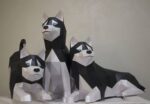 Husky acostado en papercraft 3D
