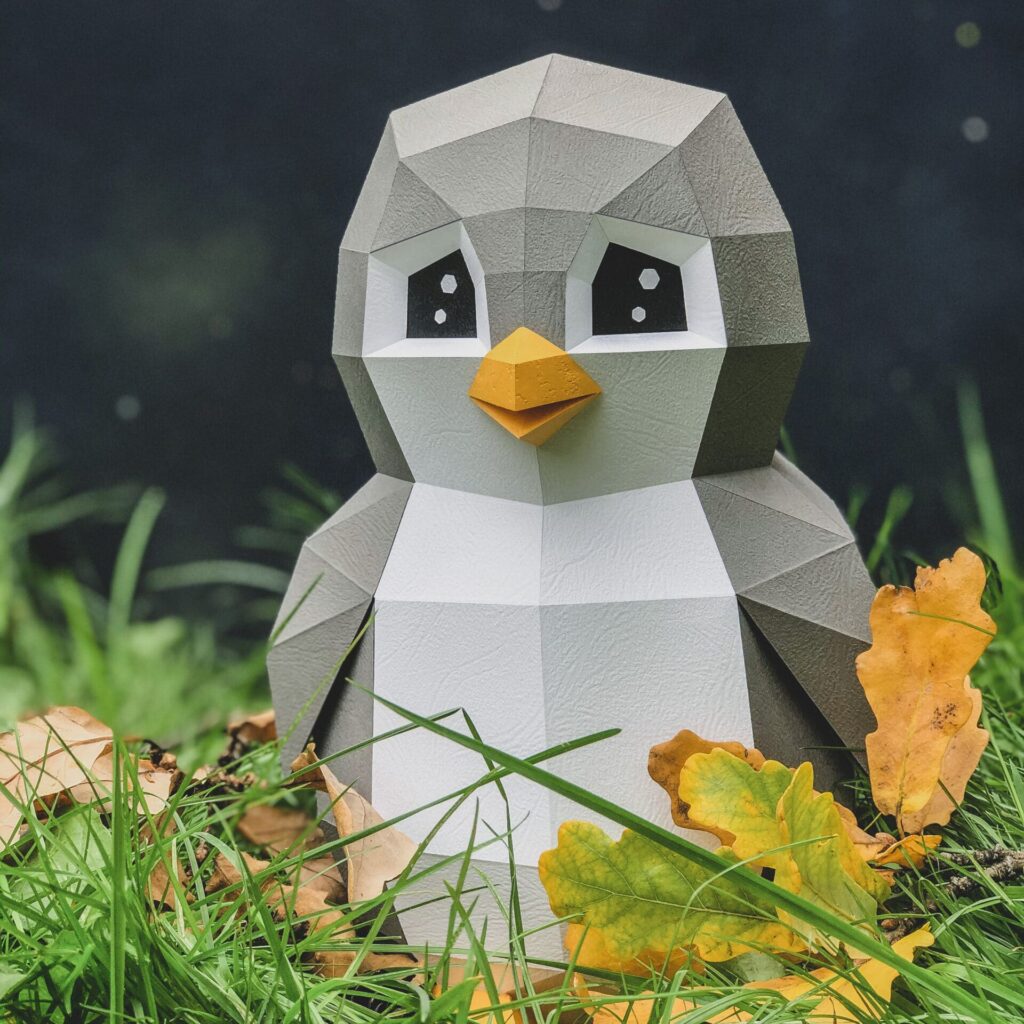 Papercraft penguin toy in 3D origami