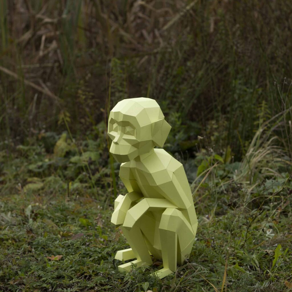 Papercraft de singe assis en origami 3D